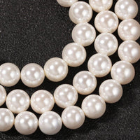 7-8mm Shell Pearl Strand Necklace with 14K Gold Plated Cross Pendant.