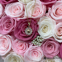Preserved Roses In A Lux Floating Heart Shaped Box With A Sunflower Necklace