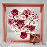 Preserved Roses In A Lux Floating Heart Shaped Box With A Sunflower Necklace
