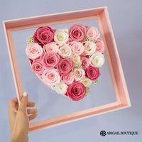 Preserved Roses In A Lux Floating Heart Shaped Box With A Sunflower Necklace