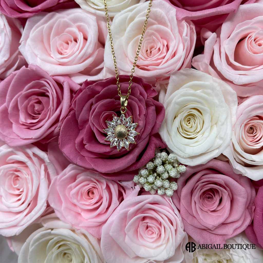 Preserved Roses In A Lux Floating Heart Shaped Box With A Sunflower Necklace