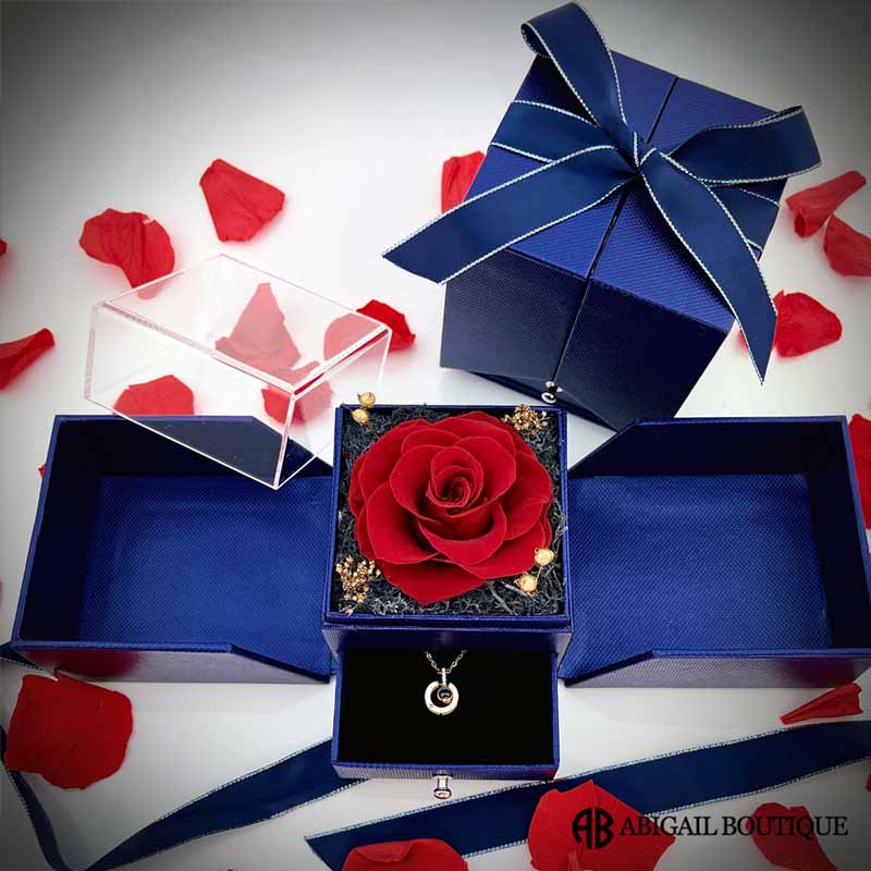 https://abigailboutique.com/cdn/shop/products/Preserved-Jewelry-Rose-Box-Royal-Blue_1200x.jpg?v=1664321414